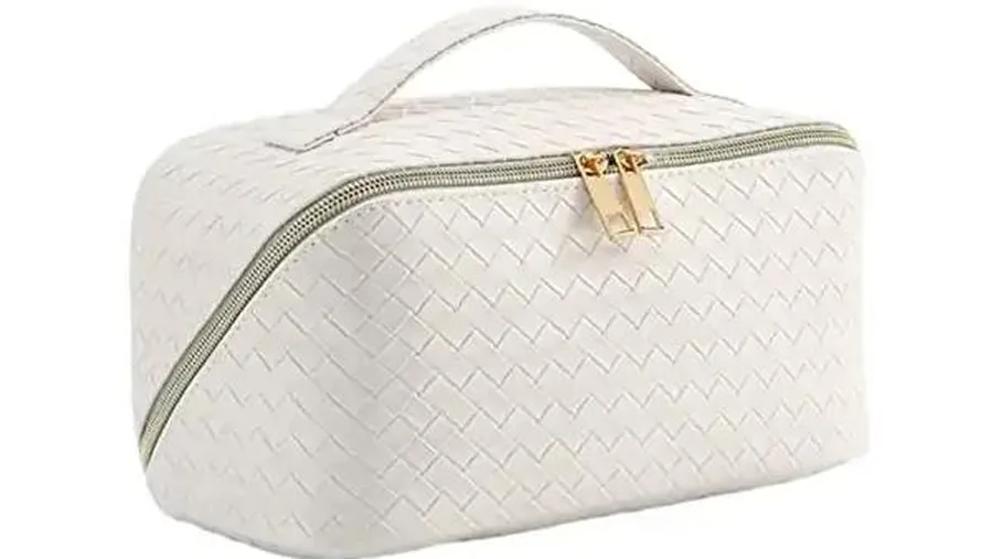 Close-up of zipper and metal hardware on a cosmetic bag