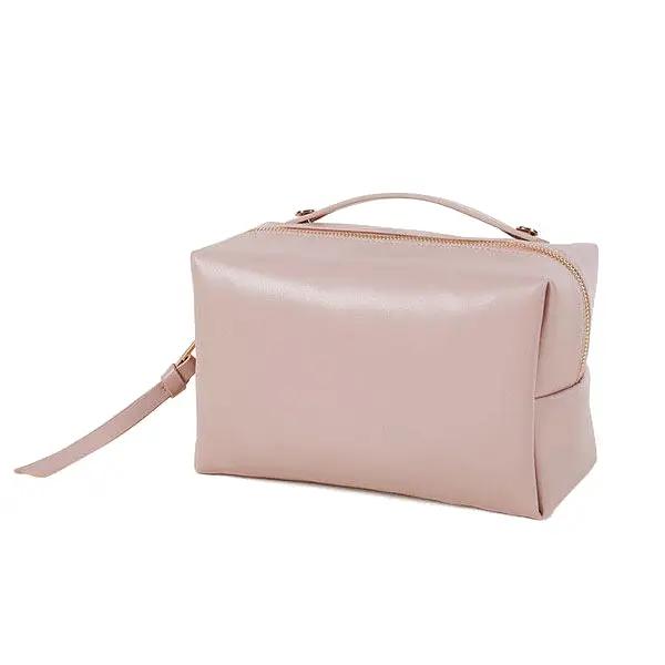 Nude pink PU cosmetic bag with gold zipper, manufactured by Camytonc